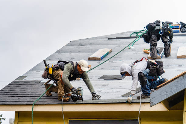 Professional Gutter Installation technician working in East Greenwich, RI